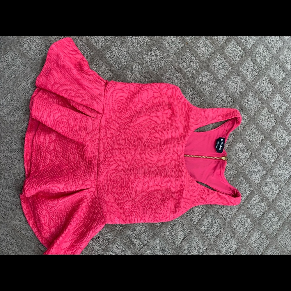 Pink ruffle bottom shirt